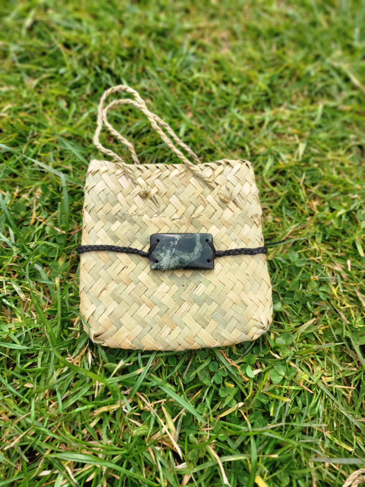 pounamu bracelet (rectangle) on black cord