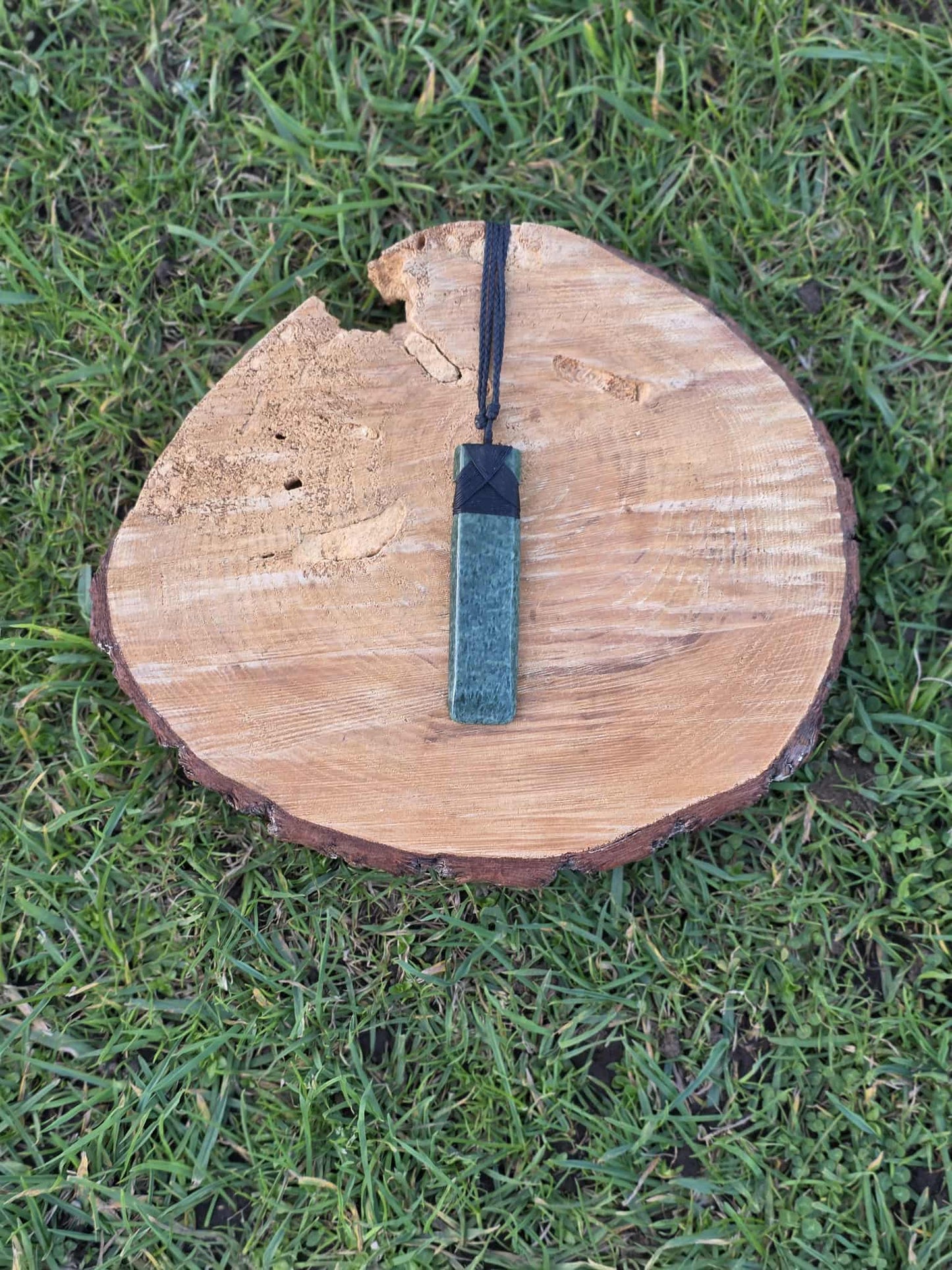 Pounamu greenstone toki (adze) necklace with black strapping