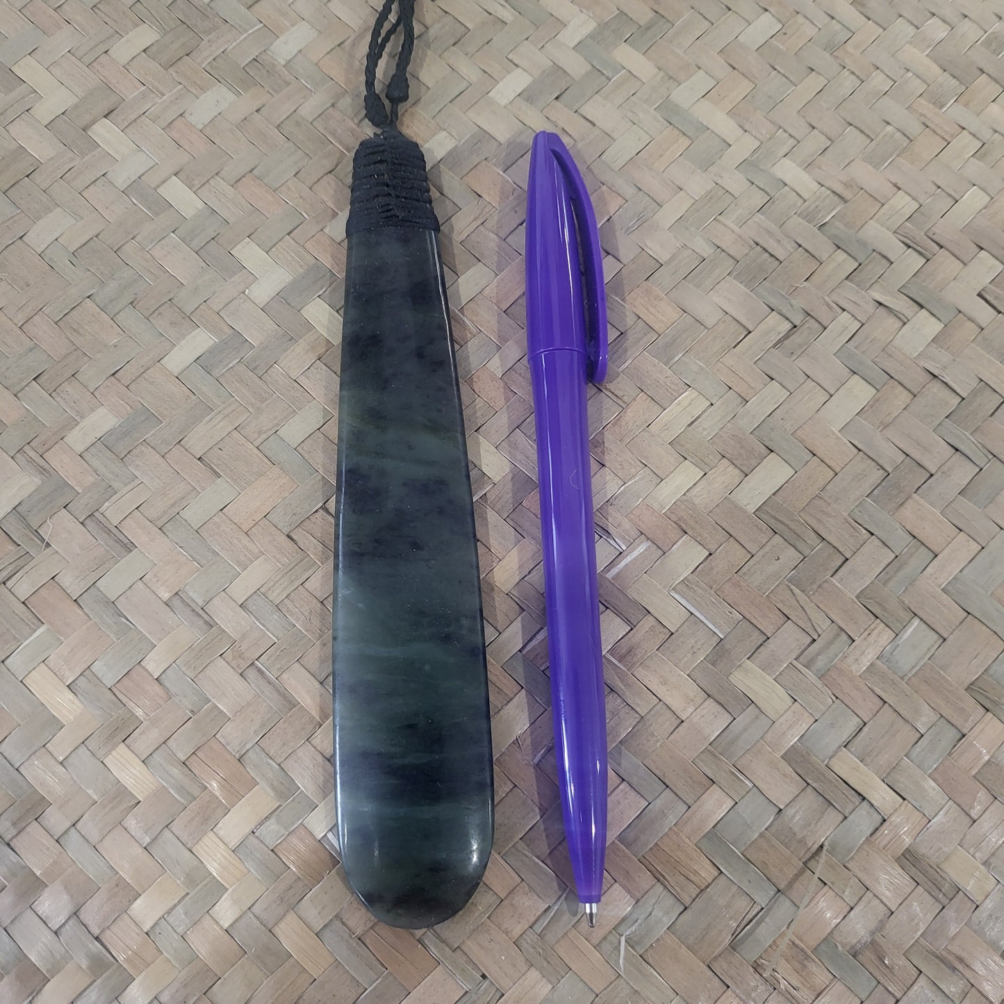 carved pounamu roimata (tear drop) necklace on black cord