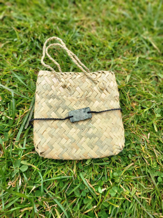 pounamu bracelet (rectangle) on black cord