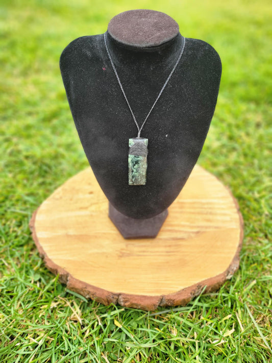 Pounamu toki (adze) necklace with beautiful colour variations