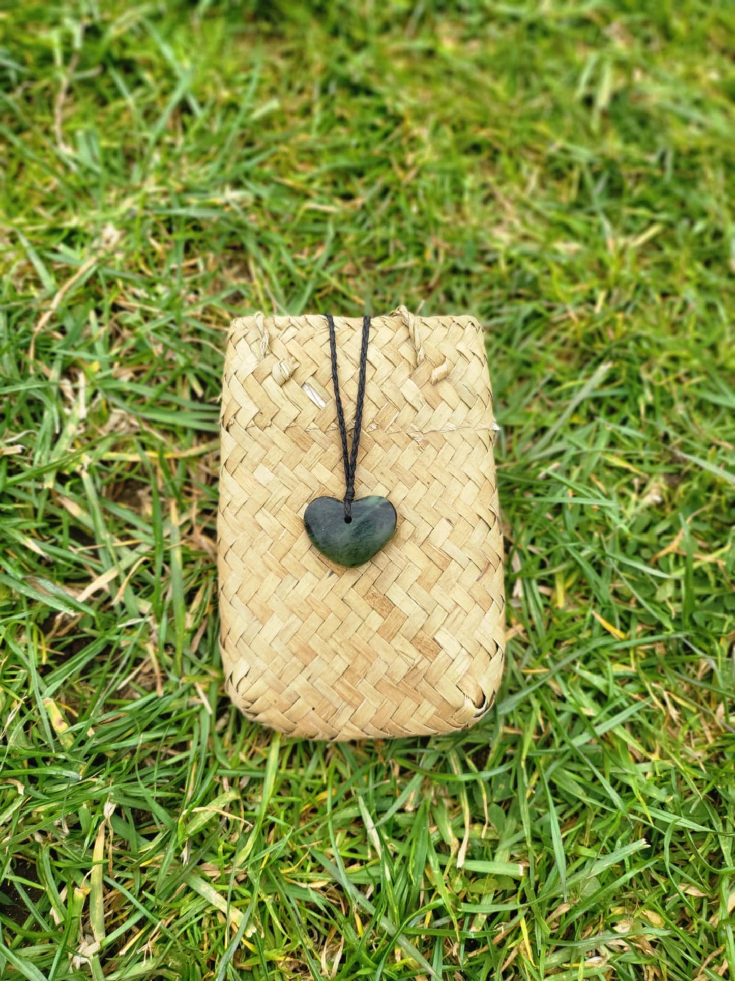 Heart shaped pounamu necklace on black cord (small)