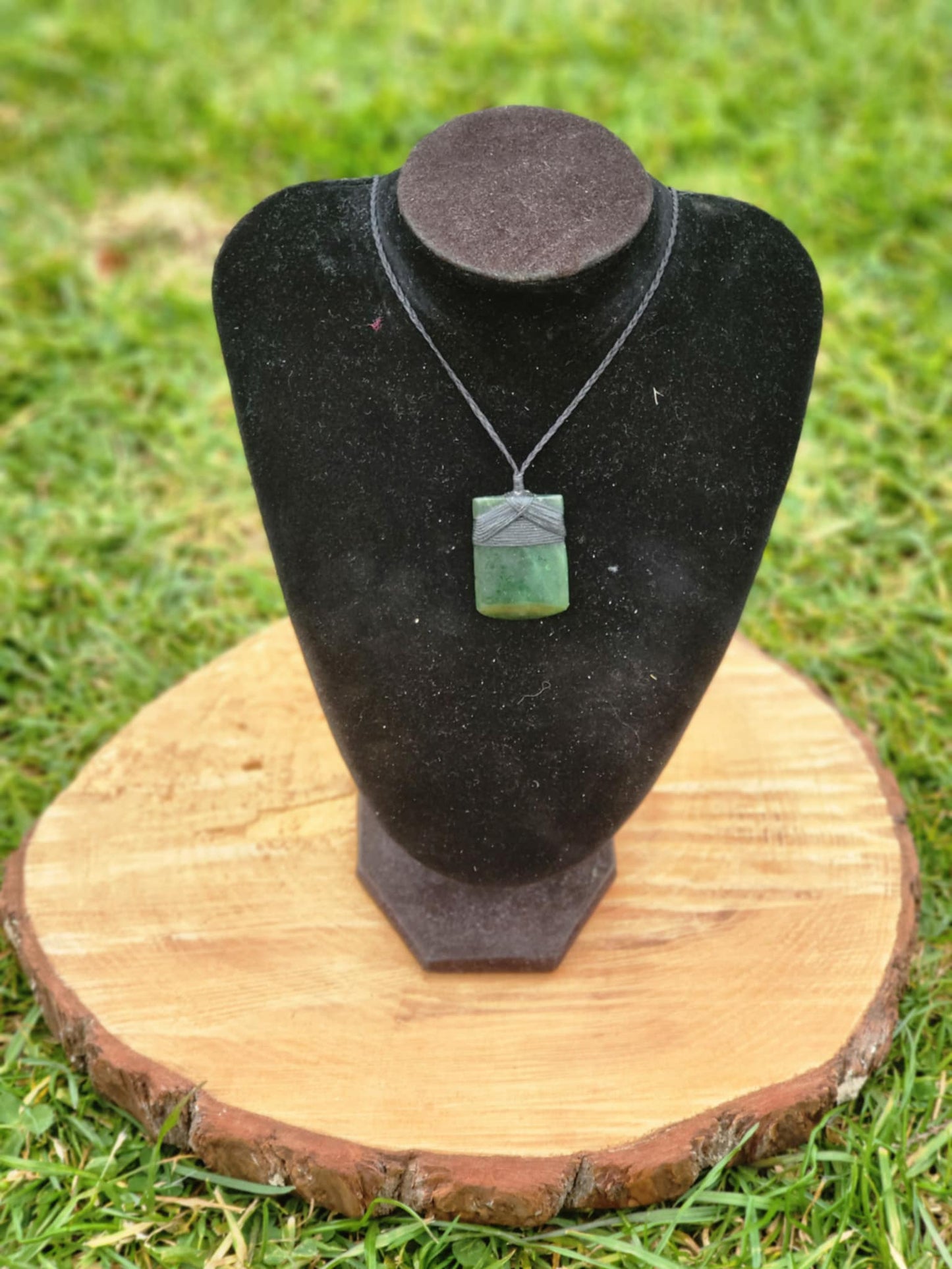 carved pounamu toki (adze) small on black cord