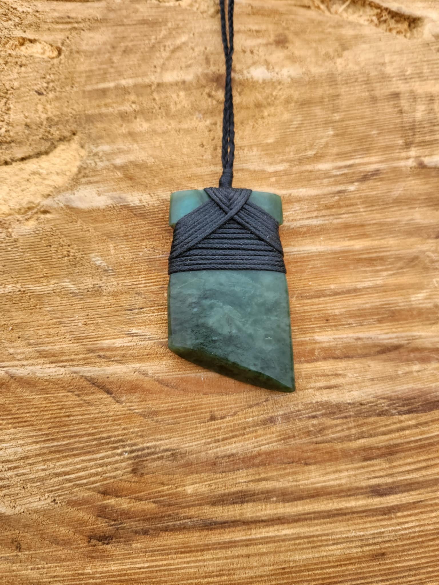 assymetrical pounamu toki (adze) necklace on black cord