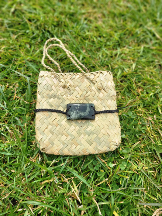 pounamu bracelet (rectangle) on black cord
