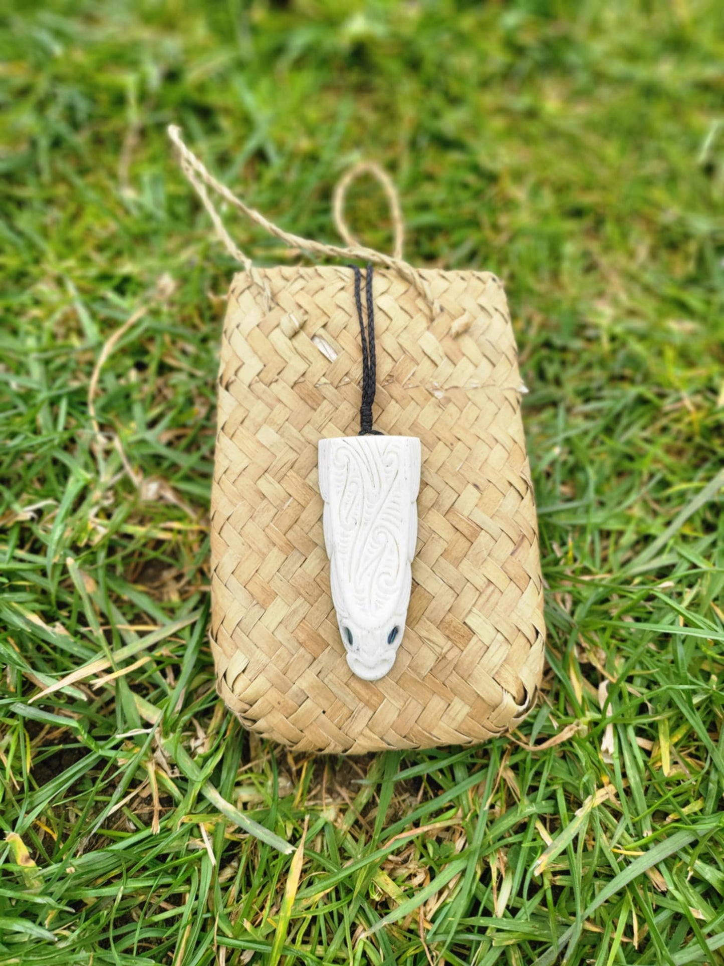 whalebone and paua shell carved eel necklace (taonga)