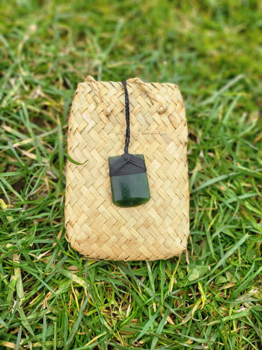 carved pounamu toki (adze) small on black cord