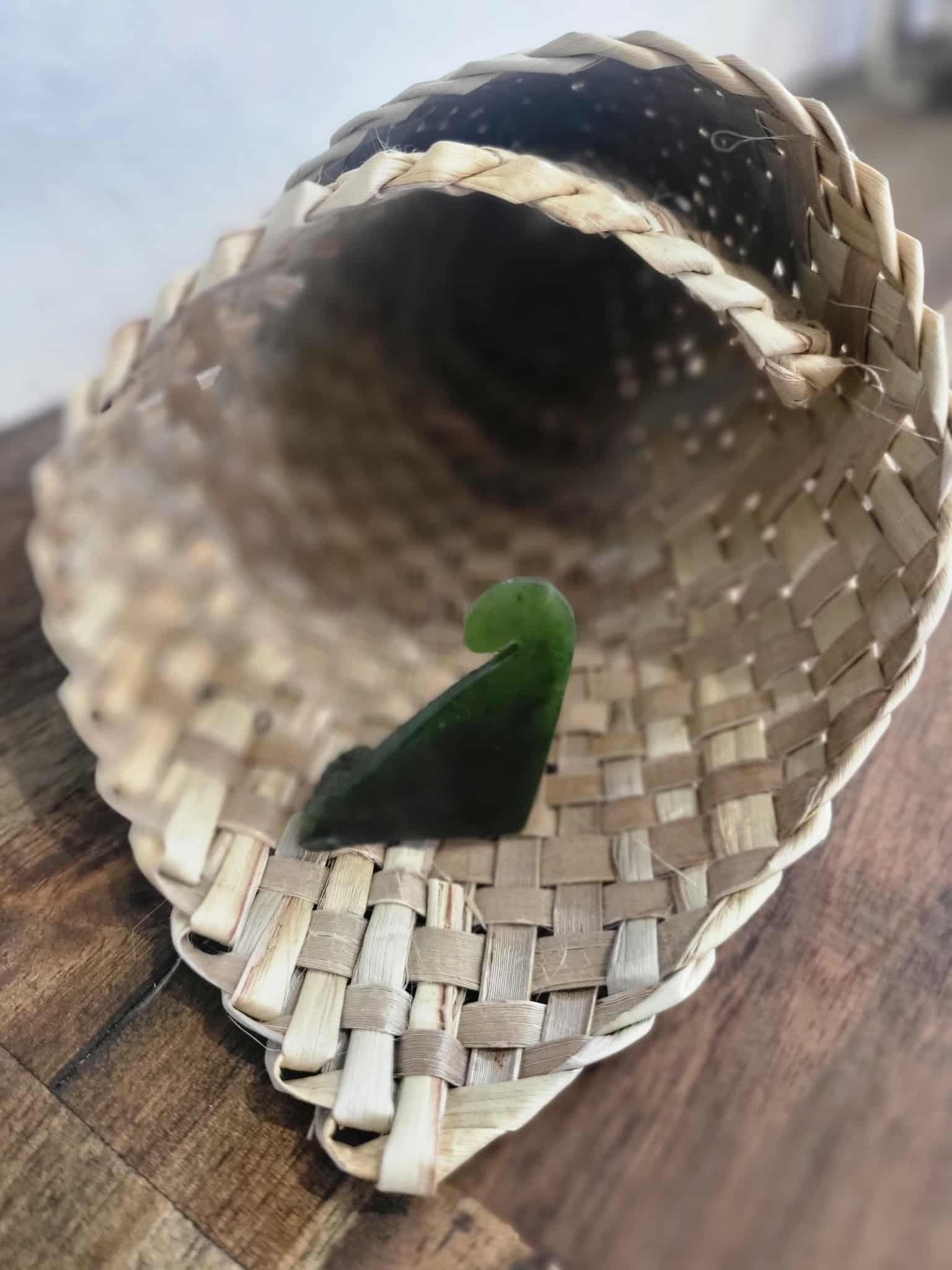 Freestanding ngaru (wave) carved from pounamu (greenstone)