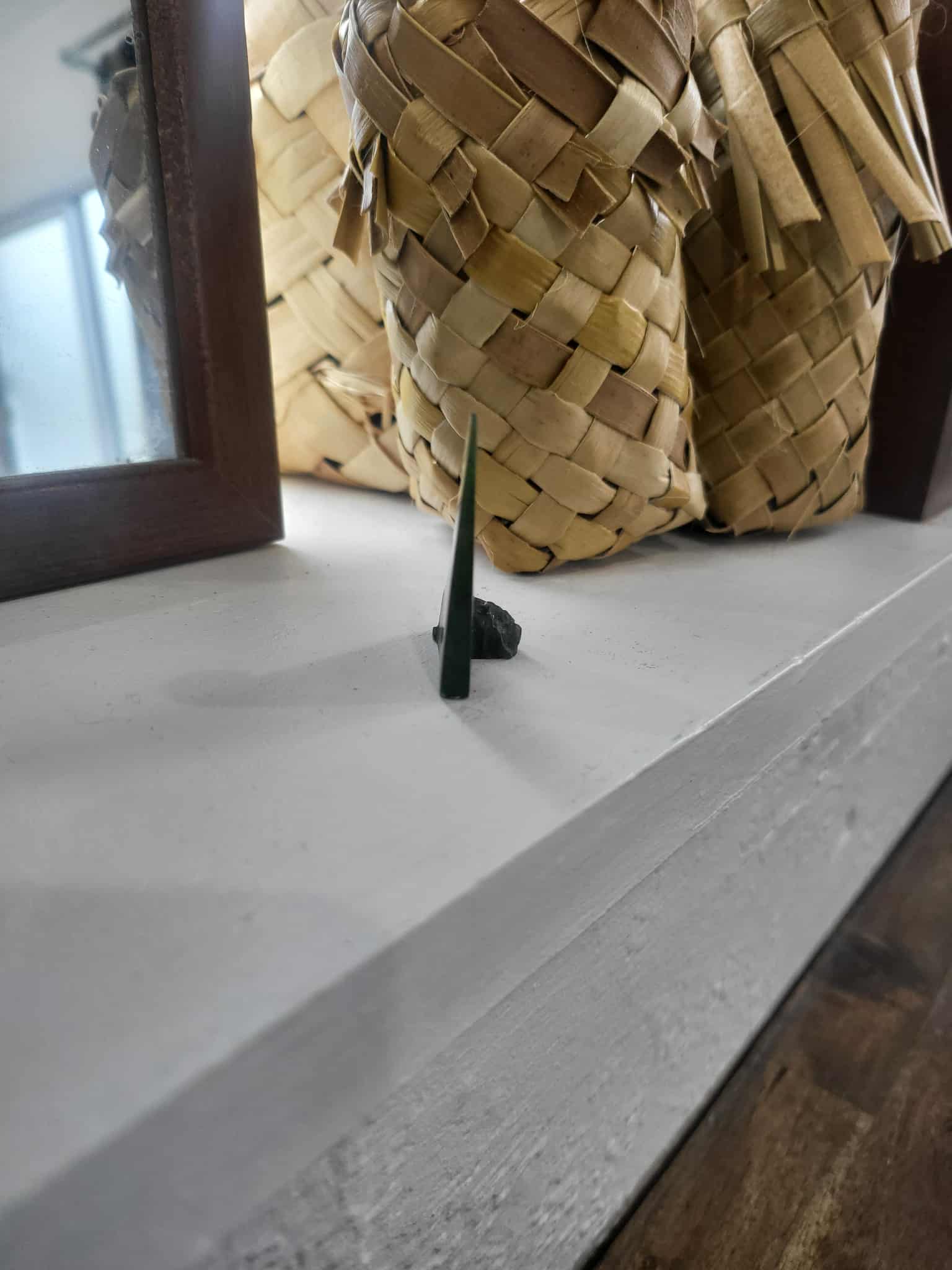 Freestanding ngaru (wave) carved from pounamu (greenstone)