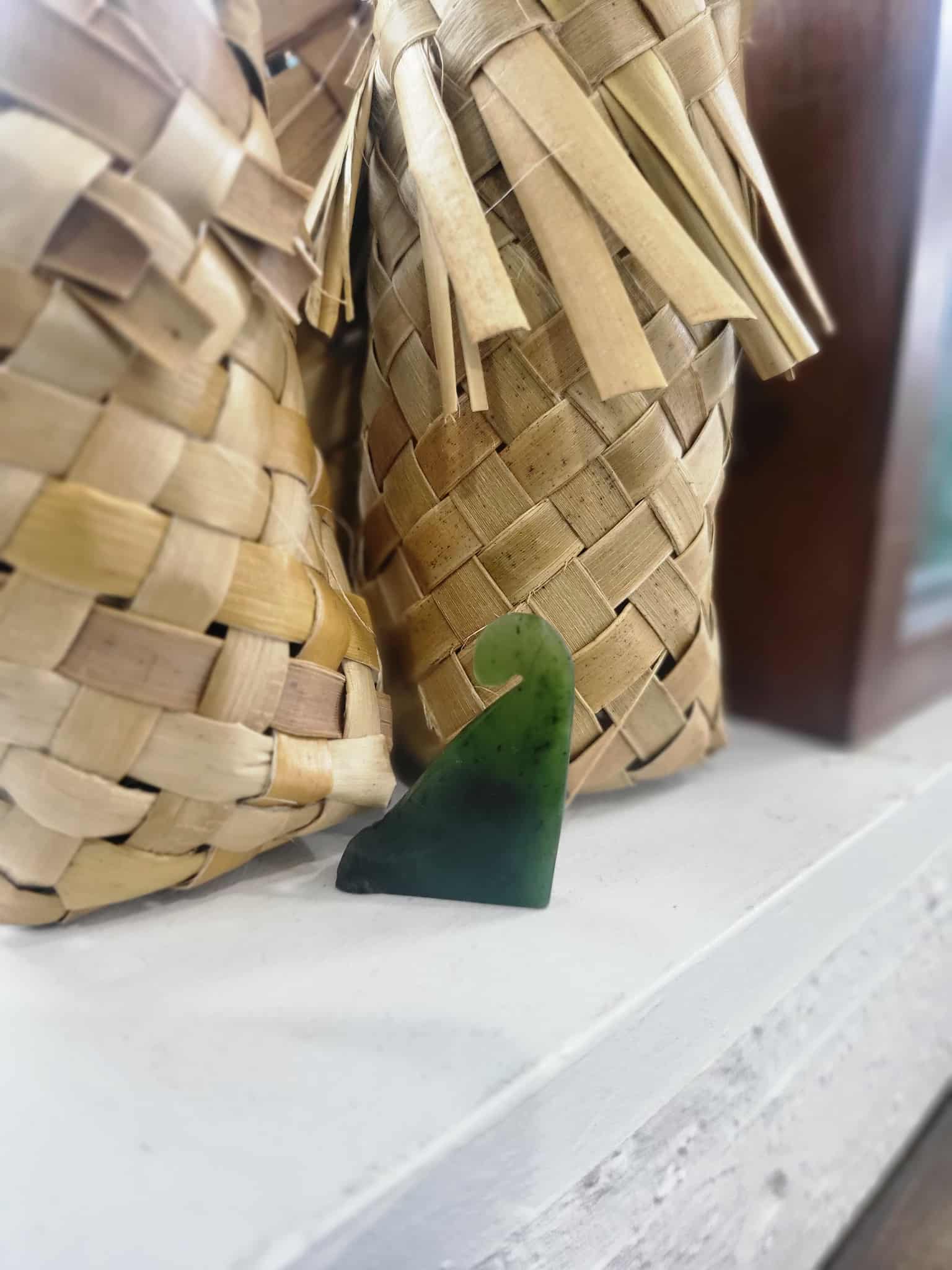 Freestanding ngaru (wave) carved from pounamu (greenstone)