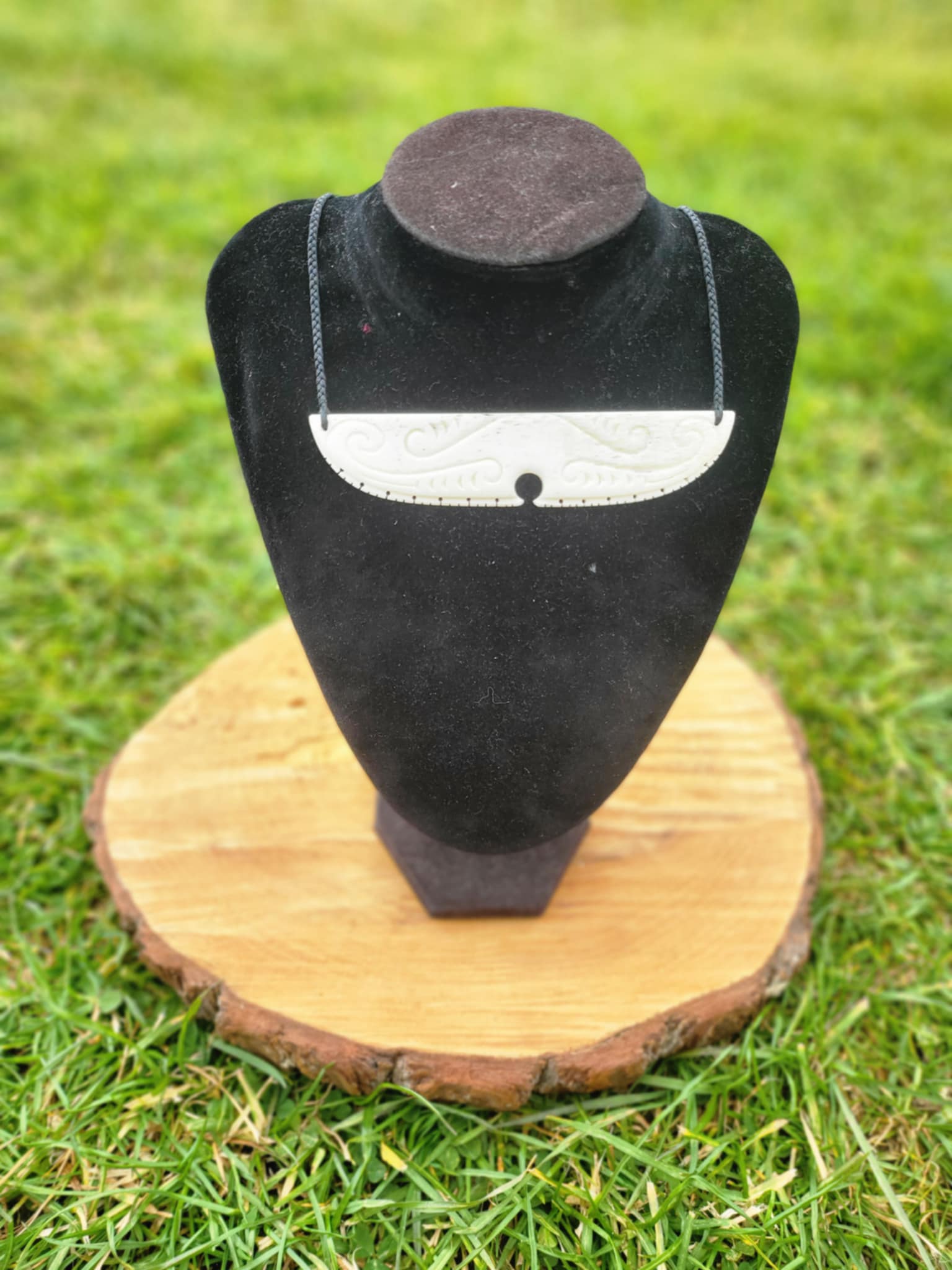 whalebone carved chest plate necklace on black cord