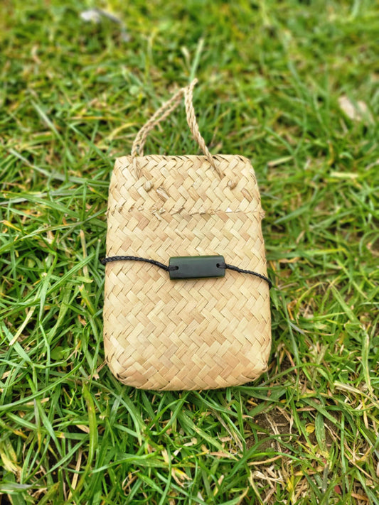 pounamu bracelet (rectangle) on black cord
