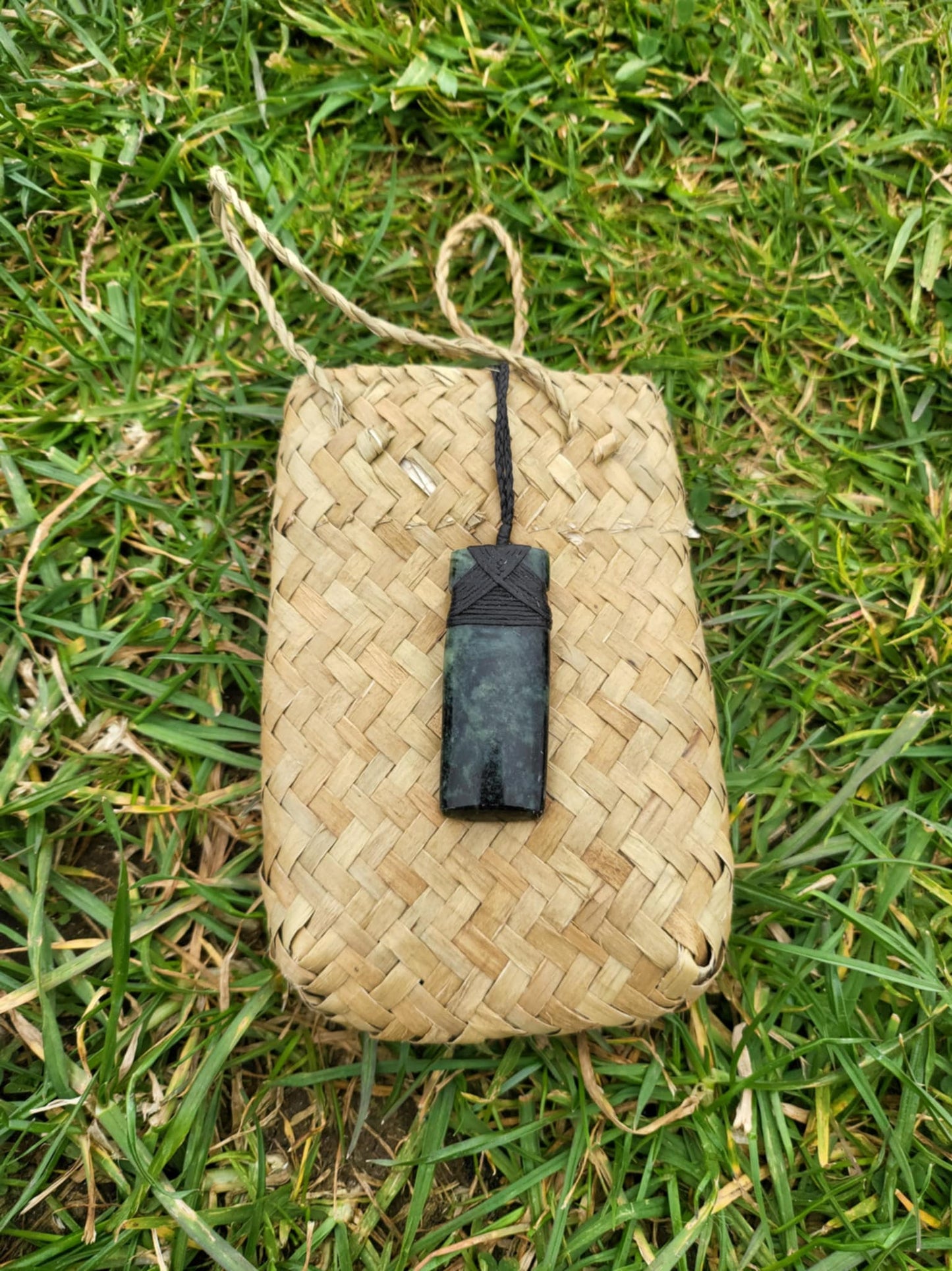 Pounamu toki (adze) necklace with beautiful colour variations