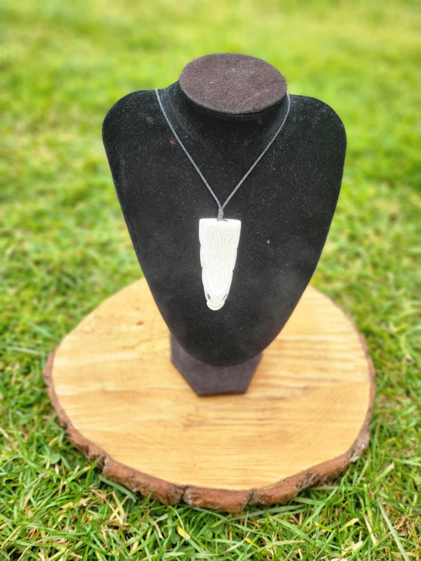 whalebone and paua shell carved eel necklace (taonga)