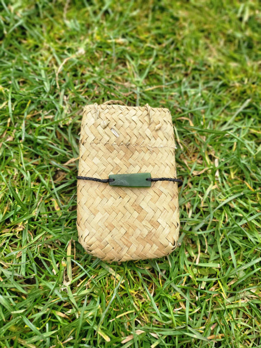 pounamu bracelet (rectangle) on black cord