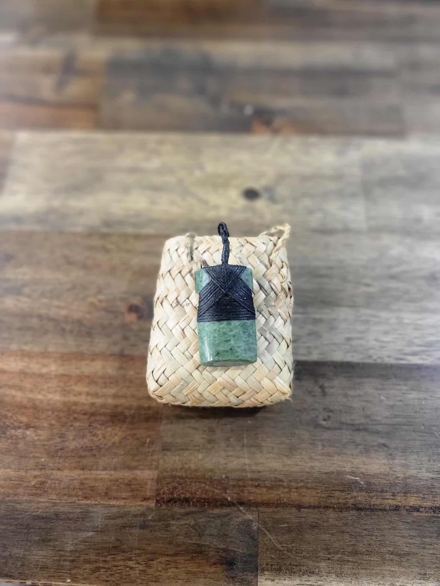 Pounamu greenstone toki (adze) necklace with black strapping