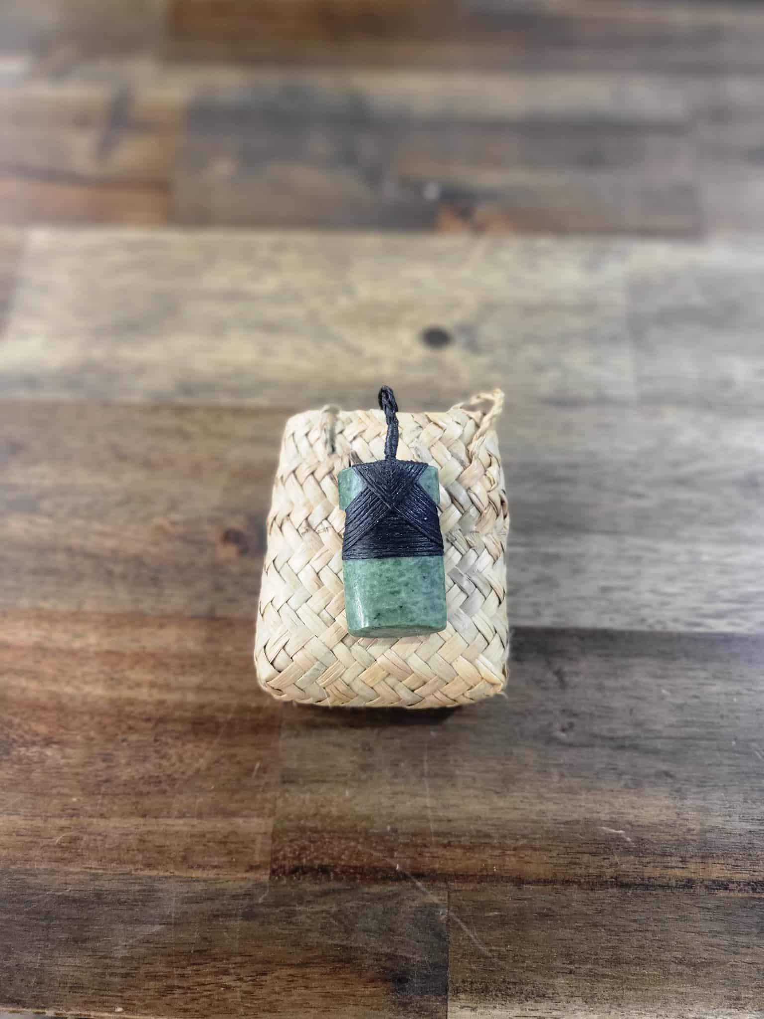 Pounamu greenstone toki (adze) necklace with black strapping