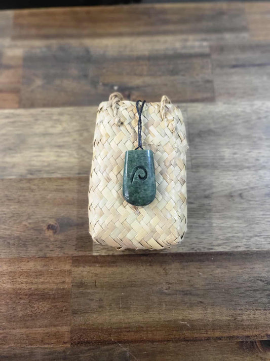 Pounamu (greenstone) roimata (tear drop) necklace on black braiding