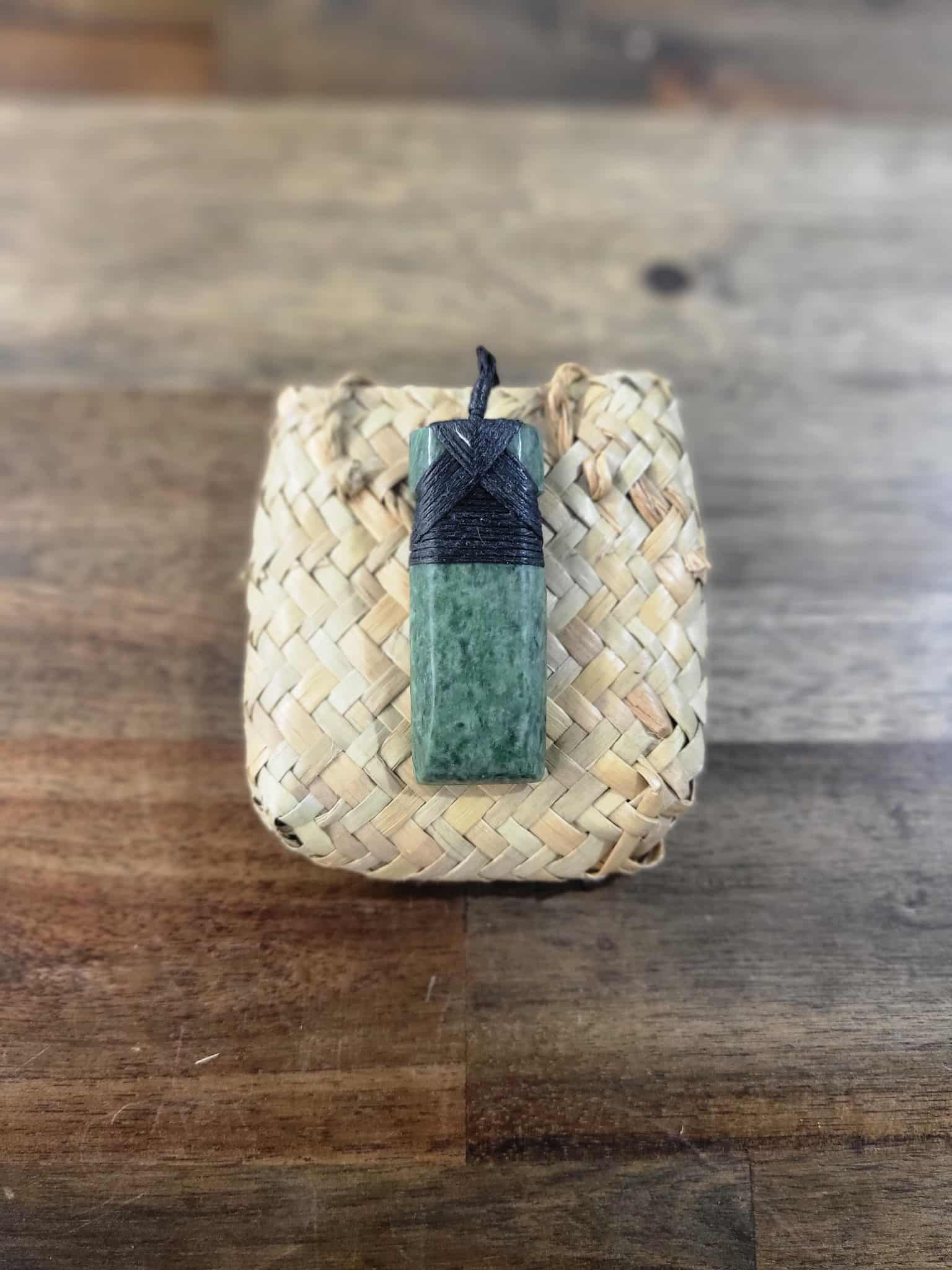 Pounamu greenstone toki (adze) necklace with black strapping