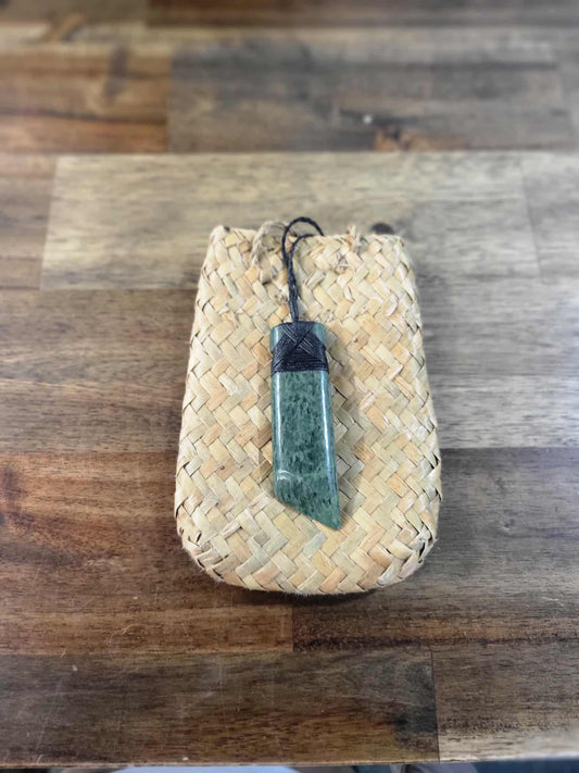 Asymmetrical pounamu greenstone toki (adze) necklace with black strapping