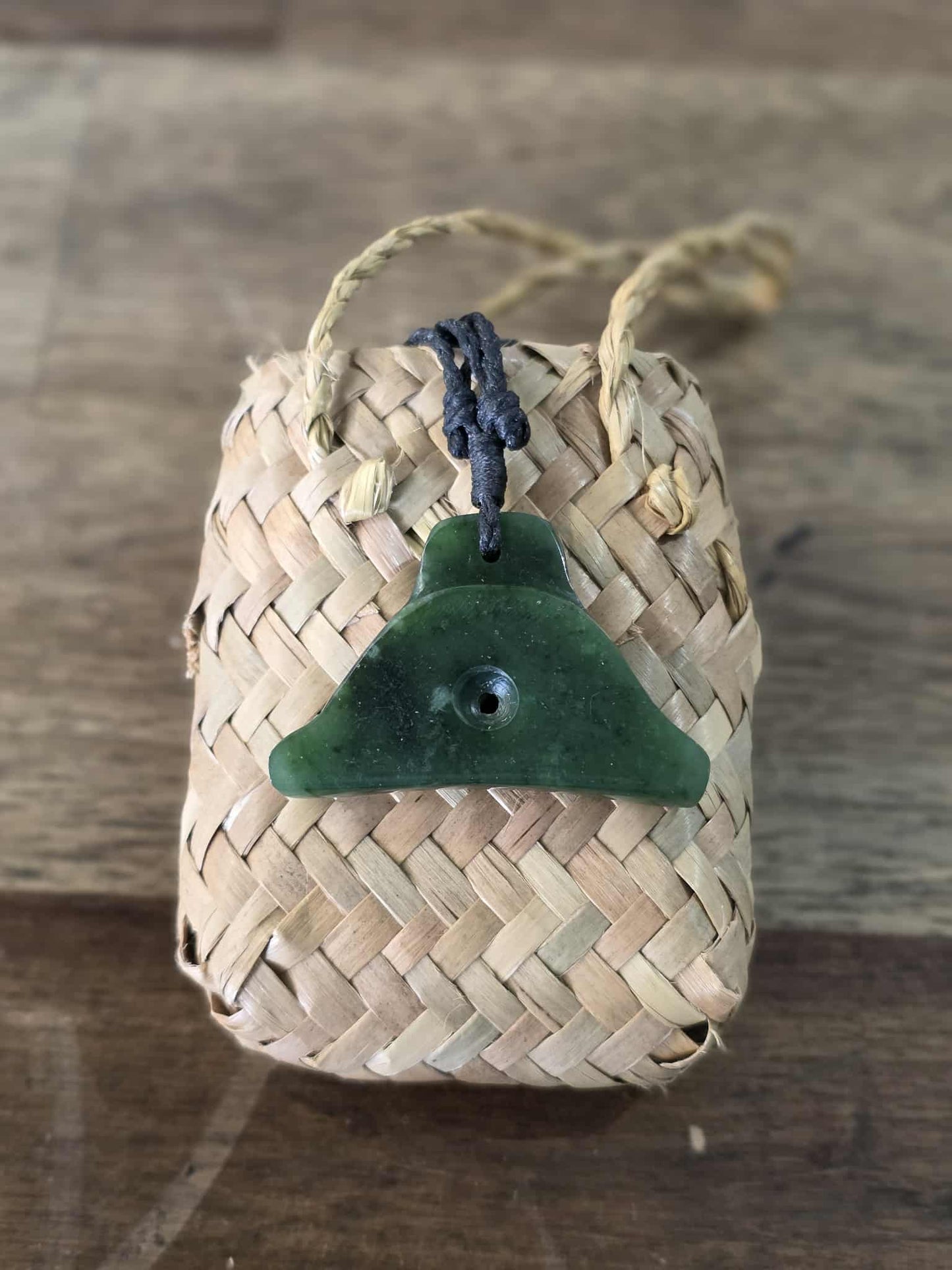 Pounamu (greenstone) shepherds whistle necklace on black braid