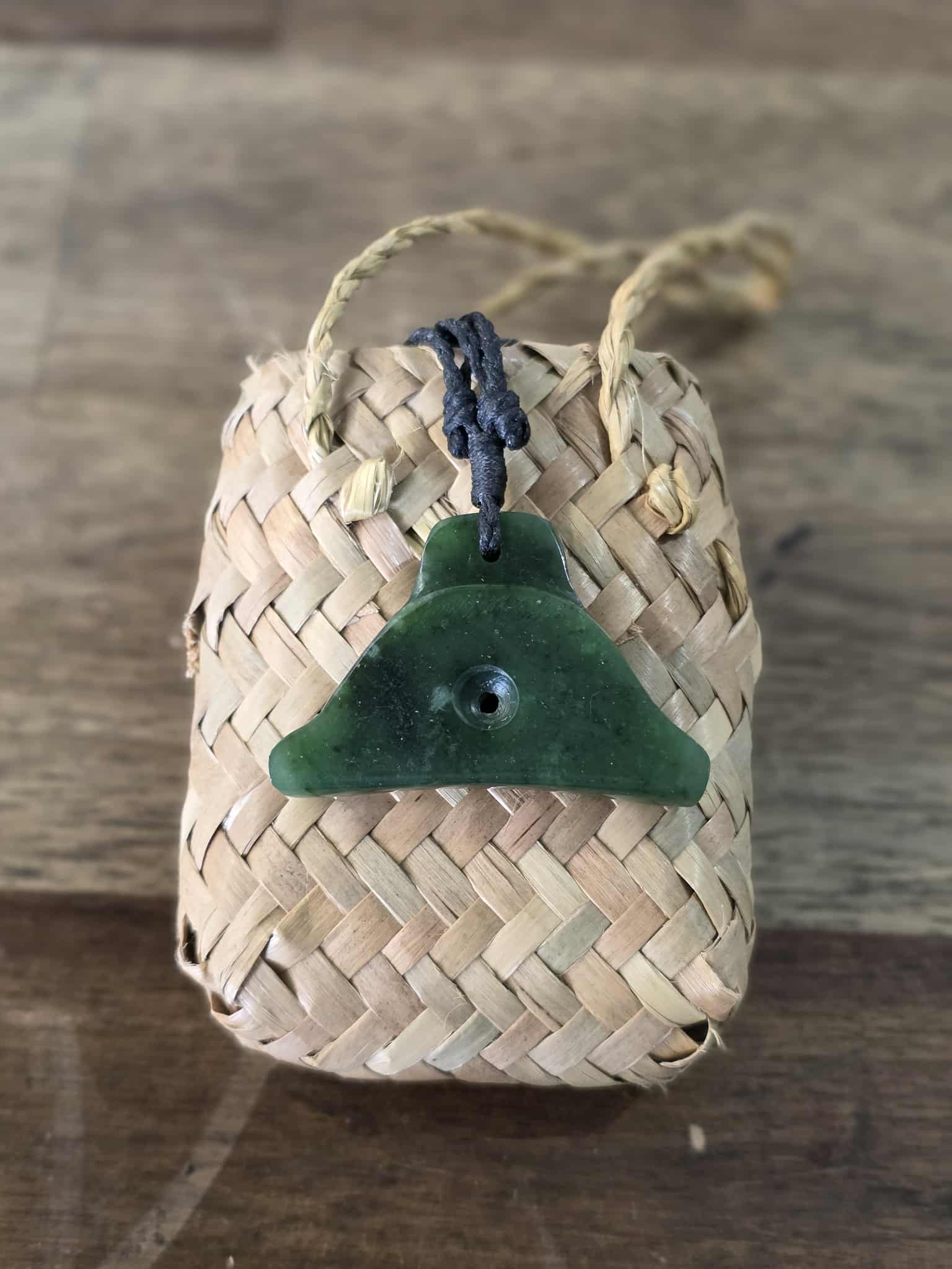 Pounamu (greenstone) shepherds whistle necklace on black braid