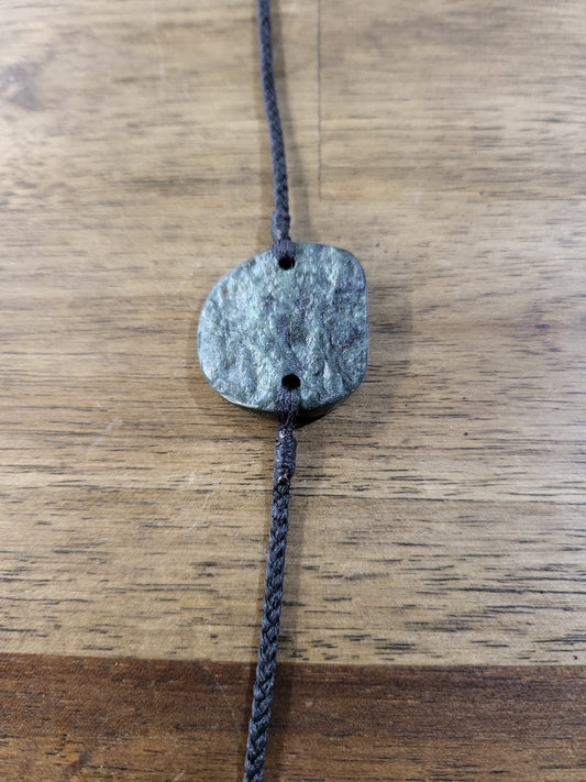 pounamu bracelet (circle) on black cord