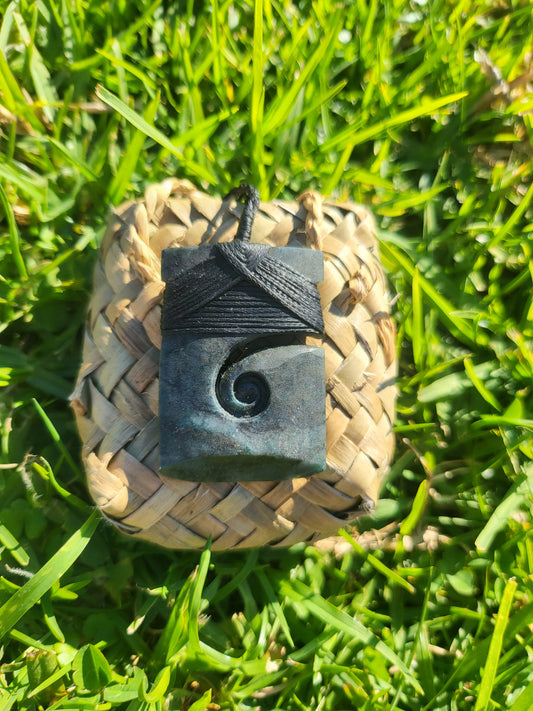 Hei Toki with Koru