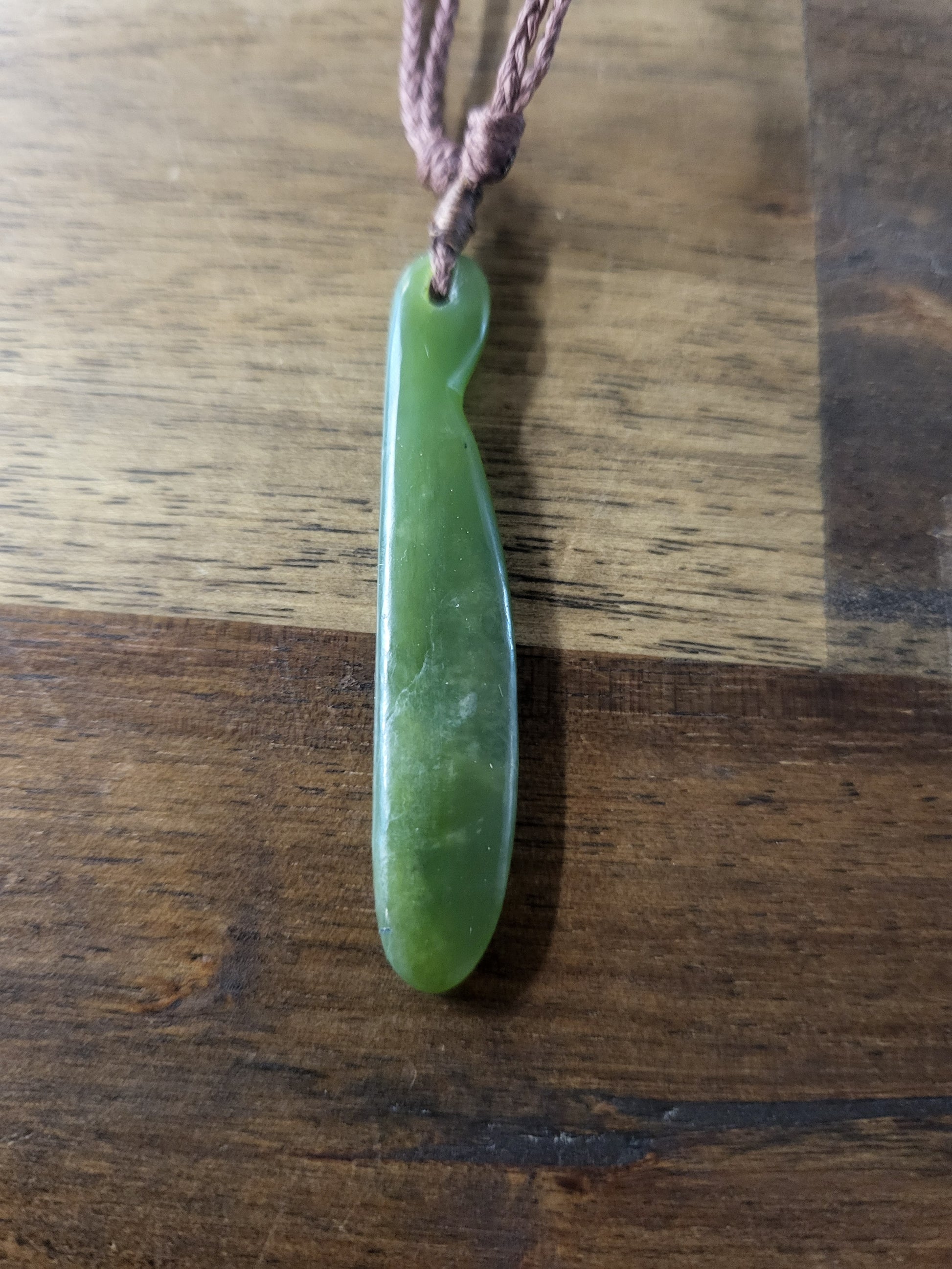 carved pounamu roimats (tear drop) necklace, on neutral cord